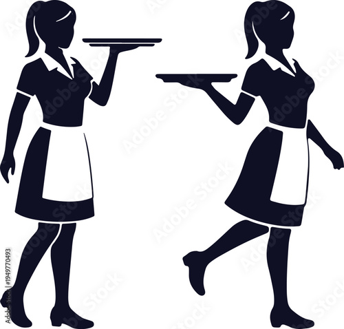 Two waitresses carrying trays in a restaurant setting