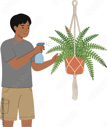 Man watering hanging plant with spray bottle indoors carefully