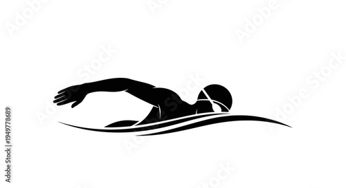 Swimmer in swimming goggles diving.