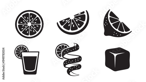 A refreshing drink with lemon slices and ice cubes on a table outdoors.