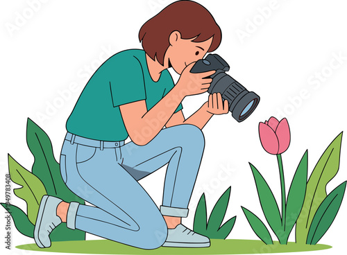 A photographer crouches to capture a pink tulip flower in nature with a camera.