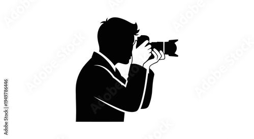 Man holding a camera to his eye.