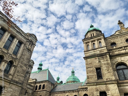Upward view of the British Columbia Parliament Buildings and mackerel sky above them, Victoria, BC, Canada