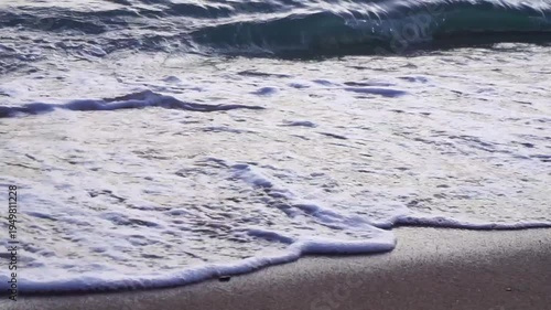 Close up shot of sea surf at beach