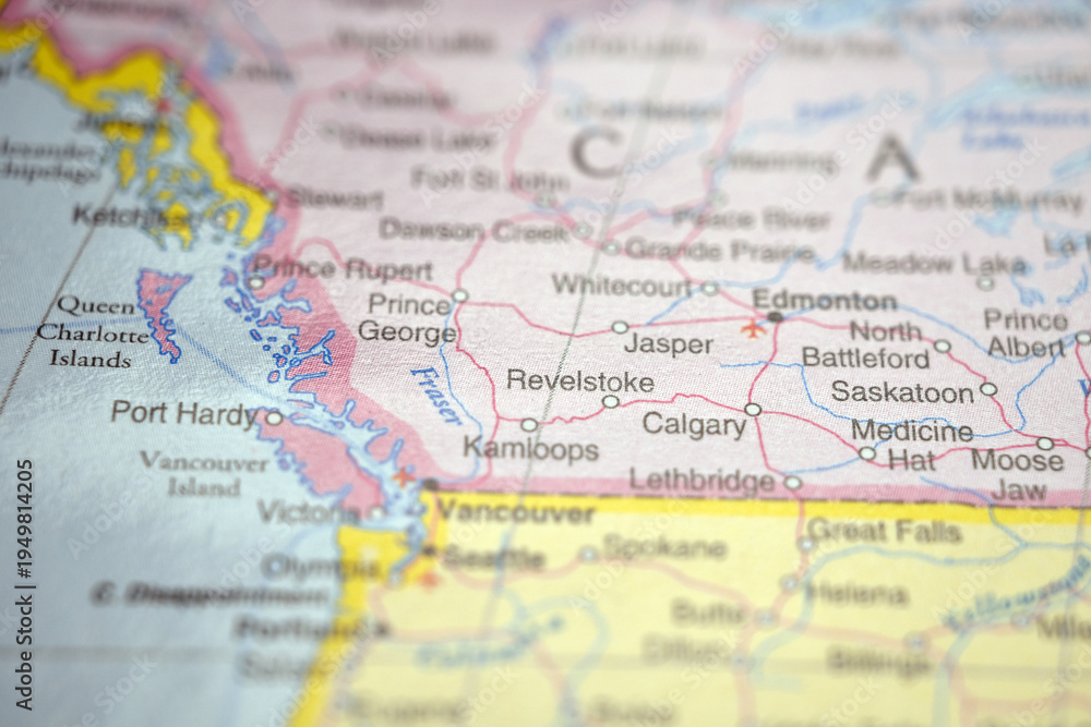 Naklejka premium Revelstoke British Columbia Canada Close Up Macro World Map Bokeh Background Geographic Image