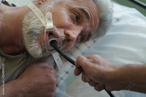 Fényképezés Gastroscopy procedure on sedated patient to examine upper digestive tract