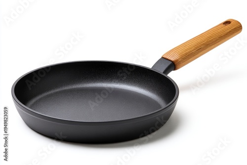 Empty nonstick frying pan isolated.