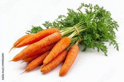 Fresh organic carrots with green leaves.