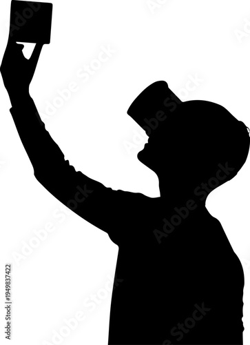 Black Silhouette of a Man Wearing Virtual Reality VR Goggles and Holding a Device Upward