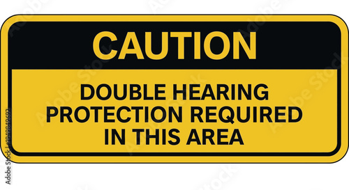 A caution sign displays a warning about double hearing protection required in a noisy industrial area with a yellow background and black text and border.