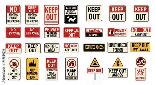 Various warning signs displayed on a metal fence in an industrial area.