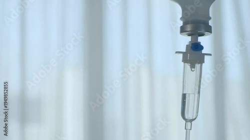 focus Closeup intravenous drip applicator in vet clinic Close up of IV drip in hospital Drip chamber of a IV with a dropper bottle on a medical