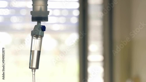 Slow-motion HD drops inside selective focus IV drip Drop of Close-up of the Infusion Process Intravenous drip chamber Closeup of recovery treatment