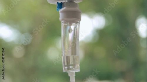 focus Closeup intravenous drip applicator in vet clinic Close up of IV drip in hospital Drip chamber of a IV with a dropper bottle on a medical