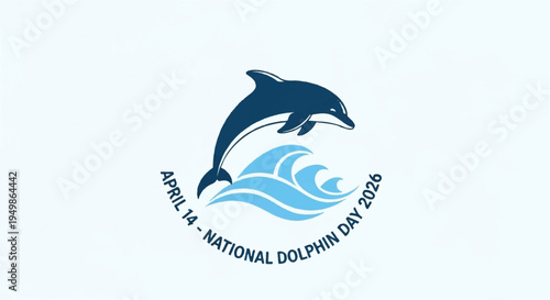 Dolphin jumping out of waves on national dolphin day in april with blue ocean water