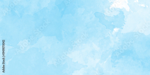 Light pastel soft cloud shapes blended blue or white watercolor, beautiful hand made watercolor texture, blue color abstraction with brush stroke, abstract blue gradient on canvas texture background.