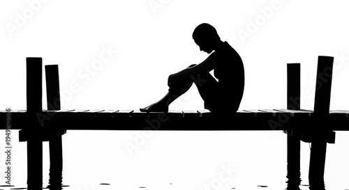 Silhouette of a lonely young man.