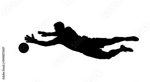 Silhouette of soccer goalkeeper diving.