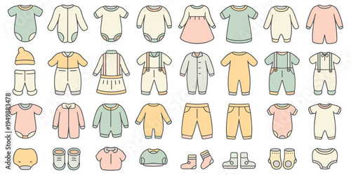 Variety of baby clothing and accessories in soft pastel tones laid out baby clothes infant wear