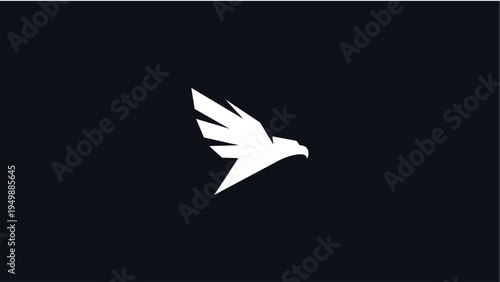 Abstract minimalist falcon or eagle bird symbol of freedom and flight, isolated on a dark background