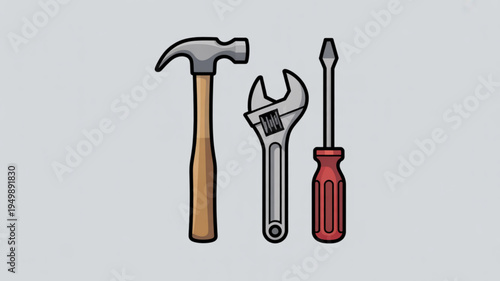 Three essential hand tools for diy projects and repairs including a hammer adjustable wrench and flathead screwdriver on a gray background