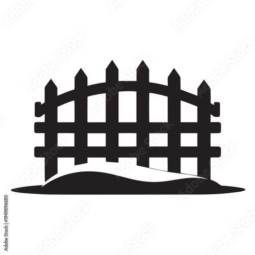 Black wooden garden fence silhouette standing in snow drift for winter landscape design and seasonal outdoor architectural decoration themes