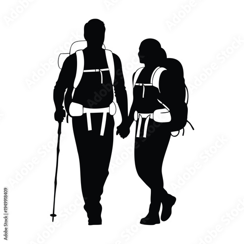 Hiking couple silhouette walking with backpacks and trekking pole