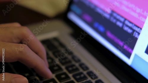 Programmer writes the code software developers working late back view Closeup coding on screen, VPN cybersecurity programmer, typing and developing IT