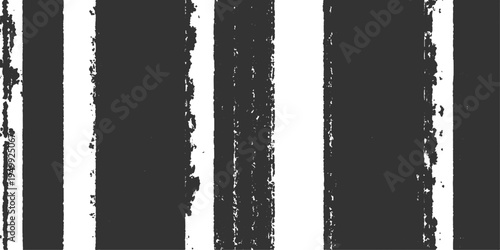 Abstract grunge black and white vertical striped background, offering a visually striking contrast and texture, evoking a sense of artistic and design minimalism.