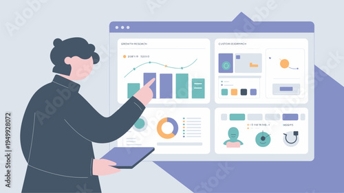 A person analyzing data on a large computer screen with a tablet in hand