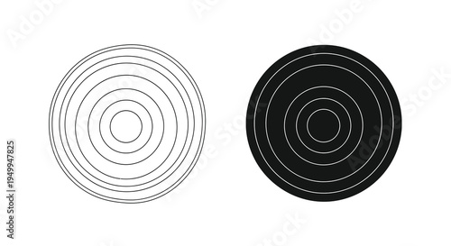 A pair of concentric circles one white on black and the other black on white demonstrate contrasting visual effects and symmetry