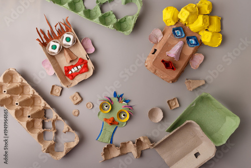 Handmade egg carton head craft for children. Perfect for art therapy centers eco friendly toy brands educational blogs school supplies and creative workshop advertisements