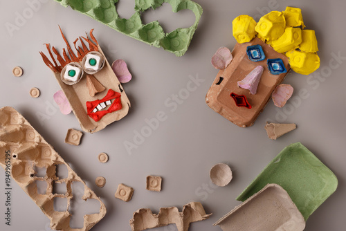 Creative kids DIY project using recycled egg cartons to make funny faces. Sustainable craft activity for preschool education, art therapy, eco friendly toy brands, and home schooling content