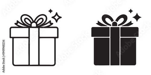 Black and white gift boxes with sparkles on top