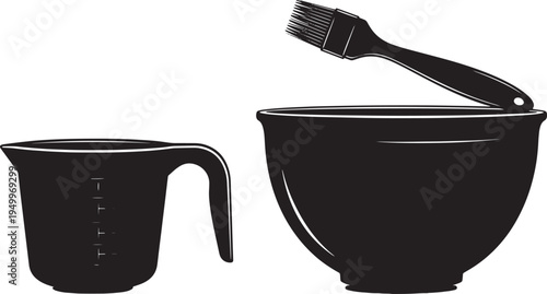 A black hair dye bowl with a brush and a measuring cup on a white background, used for hair coloring and application.