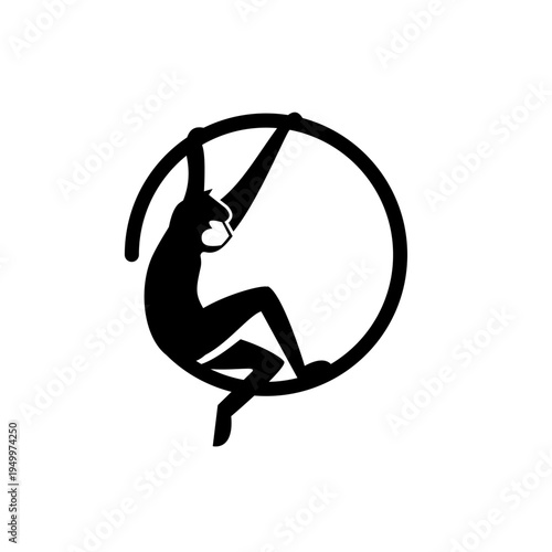 Aerial Hoop Acrobat Silhouette Performing Graceful Movement on Lyra