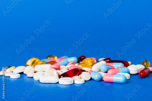 Wallpaper Mural Many different colorful medication and pills perspective view. Set of many pills on colored background Torontodigital.ca