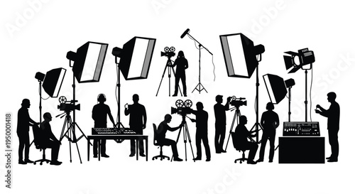Silhouettes of a professional film production crew working with cameras lighting and audio gear