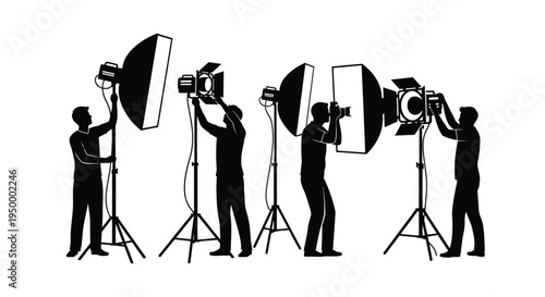 A team of professional photographers and technicians working with studio lighting equipment setup