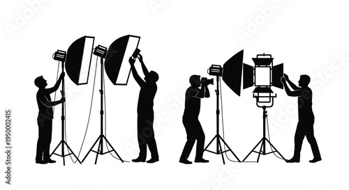 Silhouettes of professional photographers and assistants working with studio lighting equipment