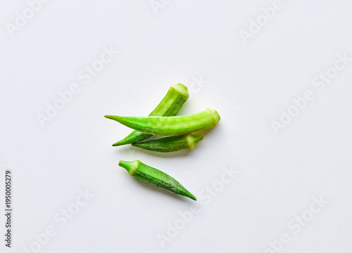 raw okra on a gray background
