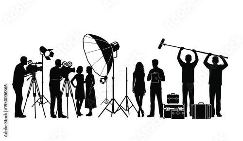 Black silhouettes of professional film crew members working on a movie production set together