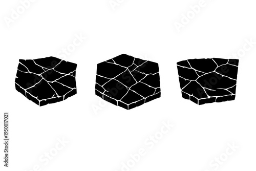 A set of three black cracked stone platforms or ground tiles in a