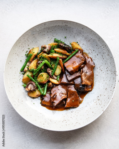 Obraz na płótnie Masterfully Plated Steak Paired With Caramelized Mushrooms And Small Potatoes