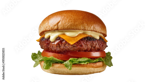 Isolated classic beef cheeseburger with melted cheddar and fresh vegetables on a toasted bun
