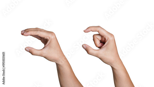 Bild auf Leinwand Female hands holding a little bit of something, Gesture indicating a pinch or small grasp, ideal for interaction and communication