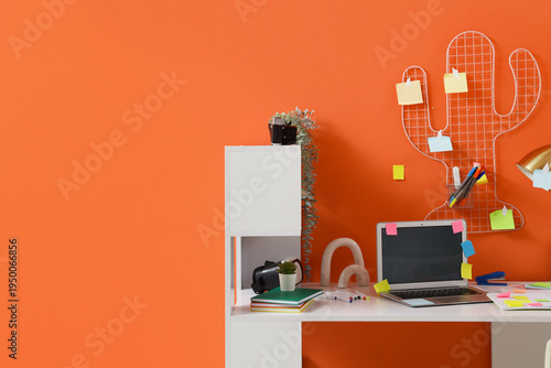 Workplace with blank laptop...