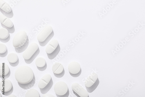 Foto Many pills on white background