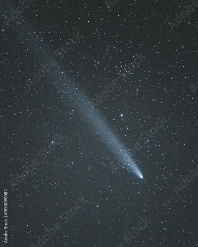 View of a celestial river of light streaks across the inky canvas of the night sky, dotted with countless stars, Auronzo di Cadore, Veneto, Italy.