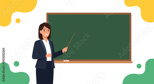 Smiling female teacher in a professional suit holding a pointer and standing in front of an empty green chalkboard.